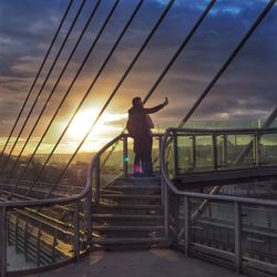 Woman looking at sunset