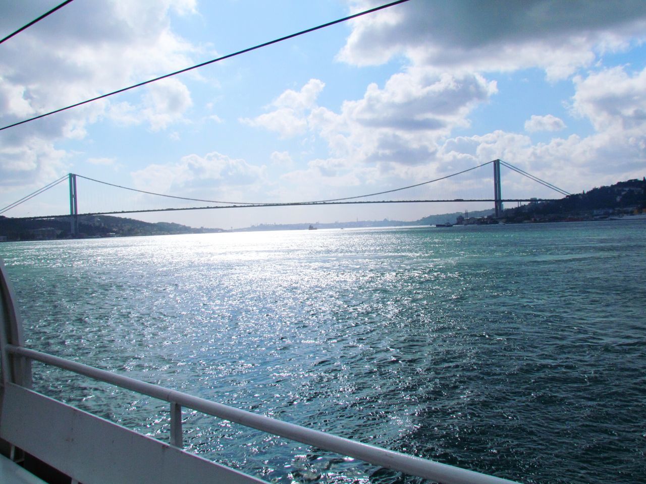 connection, bridge - man made structure, water, architecture, built structure, suspension bridge, engineering, bridge, sky, river, transportation, cable-stayed bridge, travel destinations, cloud - sky, sea, waterfront, travel, rippled, famous place, cloud