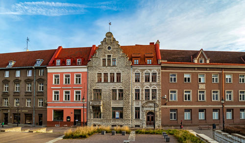 Building against cloudy sky