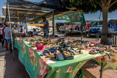 People at market stall