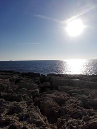 Scenic view of sea against clear sky during sunset