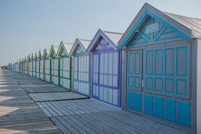 Cabins in a row on a beach in cayeux sur mer