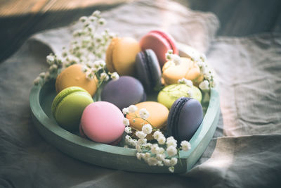 Close-up of multi colored eggs on table