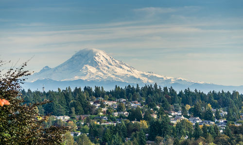 A landscape view of mount rainier from burien, washington in the fall.