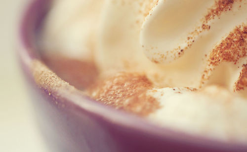 Close-up of whipped cream on hot chocolate