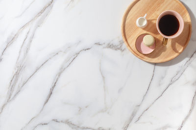 High angle view of coffee cup on table