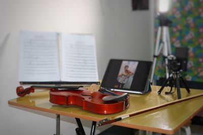 Close-up of violin on table