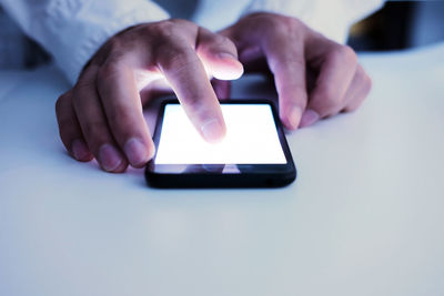 Close-up of person using mobile phone