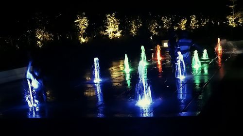 Reflection of illuminated lights in water