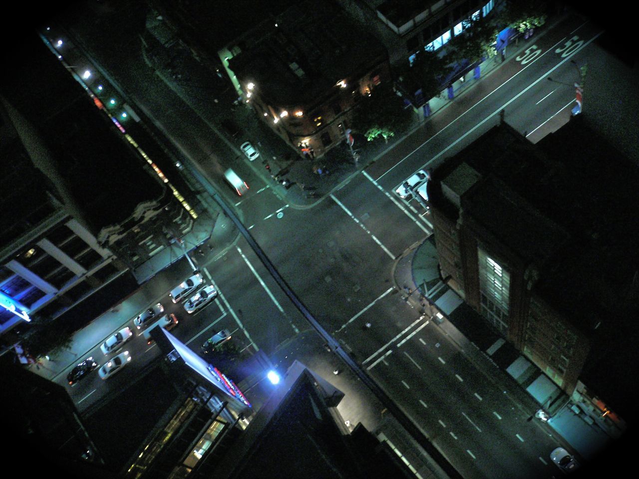 ILLUMINATED CITYSCAPE AT NIGHT