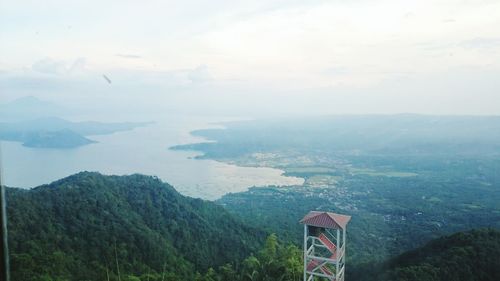 Scenic view of mountains in foggy weather