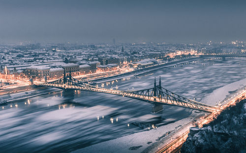 High angle view of suspension bridge at night