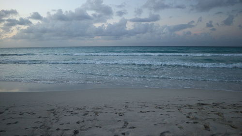 Scenic view of beach against sky
