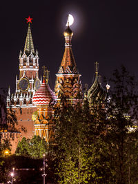 Illuminated buildings in city at night