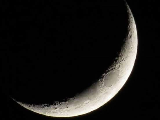 CLOSE-UP OF MOON IN DARK AGAINST SKY