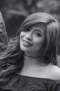 Portrait of young woman wearing braces