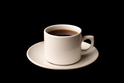 Close-up of coffee on black background