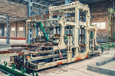 Large paving stones machine for making paving. disassembled large industrial equipment in factory