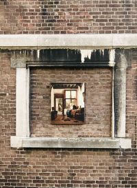 Full frame shot of window on brick wall