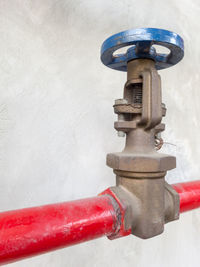 Close-up of water pipe against wall