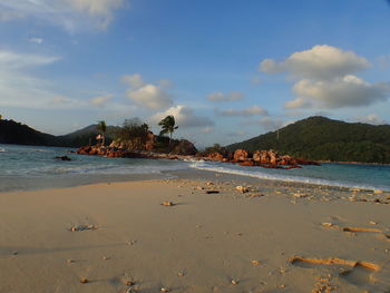 The scenery of beach with crystal blue water located at marine park redang, malaysia