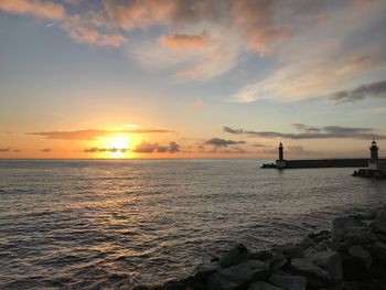 Scenic view of sea against sky during sunset