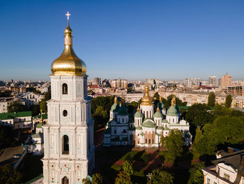 High angle view of buildings in city against sky