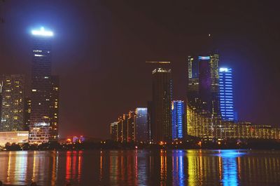 Illuminated city lit up at night