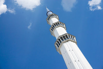 Low angle view of lighthouse against blue sky