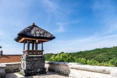 Gazebo on roof against sky