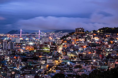 High angle view of the city lit up at night