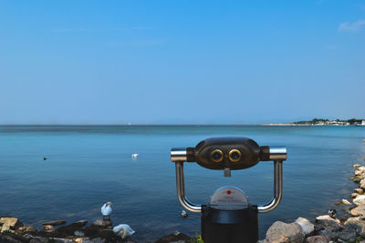 Binoculars on beach