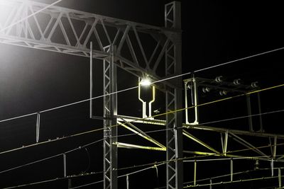 Low angle view of illuminated built structure at night