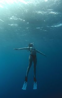 Boy swimming in sea