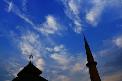 Low angle view of church against blue sky