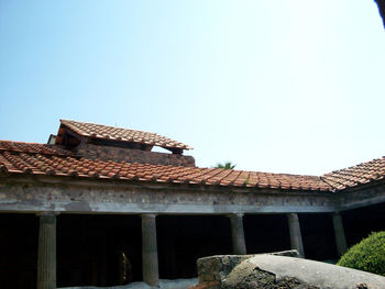Houses against clear sky