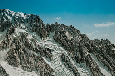 Mountain top against the blue sky. mountain tourism. mountaineering.  nature. mountain landscape.