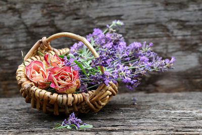 Close-up of multi colored flowers in basket