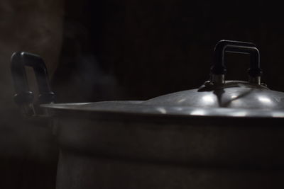 Close-up of empty drinking glass on table