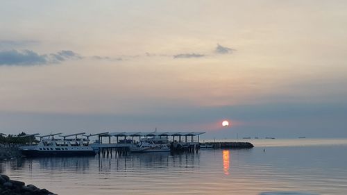 Scenic view of sea at sunset