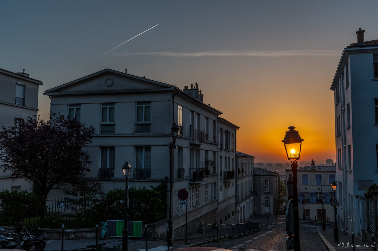 building exterior, architecture, sky, built structure, sunset, building, lighting equipment, street, nature, street light, city, no people, orange color, residential district, outdoors, tree, illuminated, plant, dusk, house