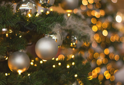 Close-up of illuminated christmas tree