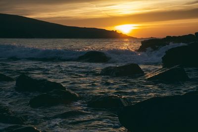 Scenic view of sea during sunset