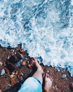 Low section of person on beach