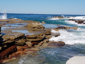 Scenic view of sea against clear sky