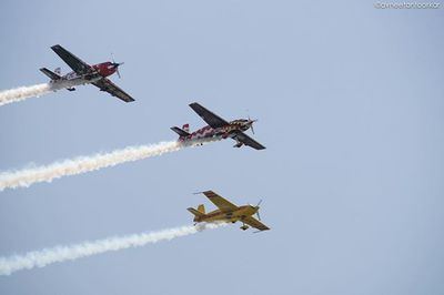 Low angle view of airplane flying in sky