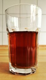 Close-up of coffee in glass on table