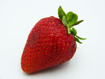 Close-up of strawberry against white background