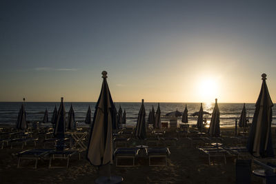 Scenic view of beach against clear sky