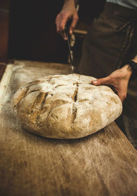 Production of baked bread in a bakery.